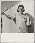 In a carrot pickers' camp, Imperial Valley, California. Woman from Broken Bow, Oklahoma. "Are you going to take my picture, wait till I get my hair combed"