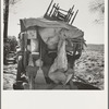 Migrant family outfit on U.S. 99 between Bakersfield, California, and the Ridge