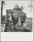 Migrant family outfit on U.S. 99 between Bakersfield, California, and the Ridge