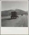 U.S. 99, Kern County, California. Migrants travel seasonally back and forth between Imperial and San Joaquin Valleys over this ridge