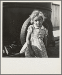 Arkansas girl in migrant camp near Greenfield, Salinas Valley, California. This is an Arkansawyers auto camp, filled almost completely with Arkansawyers recently in California. Rent ten dollars per month for one room, iron bed, electric light