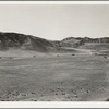 U.S. 99 on ridge over Tehachapi Mountains. Heavy truck route between Los Angeles and San Joaquin Valley over which migrants travel back and forth