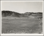 U.S. 99 on ridge over Tehachapi Mountains. Heavy truck route between Los Angeles and San Joaquin Valley over which migrants travel back and forth