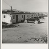 Arkansawyers auto camp. Ten cabins which rent for ten dollars a month with iron bed and electric light, one room. Greenfield, Salinas Valley, California.