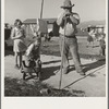 Outskirts of Salinas, California. Rapidly growing settlement of lettuce workers. Family from Oklahoma settling in makeshift dwelling