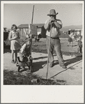 Outskirts of Salinas, California. Rapidly growing settlement of lettuce workers. Family from Oklahoma settling in makeshift dwelling