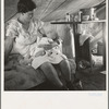 Young migrant mother with six weeks old baby born in a hospital with aid of Farm Security Administration (FSA) medical and association for migratory workers. She lives in a labor contractors camp near Westley, California