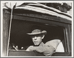 Merced (vicinity), California. Migratory cotton picker on highway near Merced, California. He and his family from Independence, Kansas, have been looking for work chopping cotton