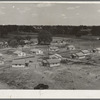 Partially completed homes for agircultural workers, to enable them to settle permanently. These houses rent for $8.20 per month, which includes water and electricity. This tract adjoins the migratory labor camp. Farmersville, Calif. May, 1939