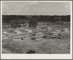 Partially completed homes for agircultural workers, to enable them to settle permanently. These houses rent for $8.20 per month, which includes water and electricity. This tract adjoins the migratory labor camp. Farmersville, Calif. May, 1939