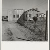 House which adjoins that of family described in 19553-E. There are approximately one hundred such homes, each with about an acre at Highway City, California, which show various degrees of ability in self resettlement. Nearly all are on Works Progress Administration (WPA)