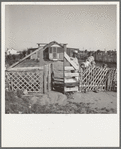 Highway City, California. Near Fresno. See General caption. Also 19553 for complete caption. Family from Oklahoma