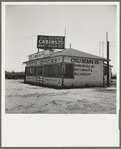 Between Tulare and Fresno on U.S. 99. See general caption. A large variety and great number of small eating places face the highway. This one is managed by ex-Texans, hence "Lone Star Inn"