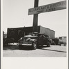 Near Tulare, California, U.S. 99. See general caption. Used car lots and auto wrecking establishments add to the litter which fronts this highway