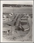 Partially completed homes for agricultural workers to enable them to settle permanently. These houses rent for eight dollars and twenty cents per month, which includes water and electricity