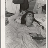 Tulare County, California. Sick woman in Farm Security Administration (FSA) camp for migratory agricultural workers [Farmersville, Calif.]