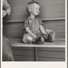 Tulare County, California. In Farm Security Administration (FSA) camp for migratory workers. Baby with club feet wearing homemade splints inside shoes [Farmersville, Calif.]