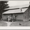 Tobacco sharecroppers and family at back of their house. Person County, North Carolina