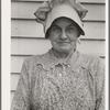 Member of the congregation of Wheeley's church who is called "Queen." She is wearing the old fashioned type of sunbonnet. Her dress and apron were made at home. Near Gordonton, North Carolina