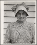 Member of the congregation of Wheeley's church who is called "Queen." She is wearing the old fashioned type of sunbonnet. Her dress and apron were made at home. Near Gordonton, North Carolina