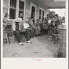 Rural filling station becomes community center and general grounds for loafing. The men in baseball suits are on a local team which will play a game nearby. The team is called the Cedargrove Team. Fourth of July, Near Chapel Hill, North Carolina