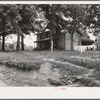 The one-and-a-half story part of this house was built fifty to sixty years ago. The two-story part was built in 1900. Farm is owned by a woman whose husband died seventeen years ago. Person County, North Carolina