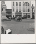 Oxford, North Carolina. Small agricultural center. Note everpresent Confederate monument, and calf in a two horse wagon