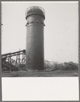 Pelican Bay Lumber Company. The burner is characteristic of the Northwest landscape as grain elevator is to the Plains. There are many types of variations. It is an essential part of the sawmill. Disposes of sawdust and waste. Near Klamath Falls, Klamath County, Oregon