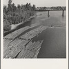 Log rafts on the Williamette River between Salem and Independence, Oregon