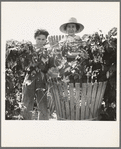 Eleven year old boy and his grandmother, migratory, pick hops side by side. Oregon, Polk County, near Independence. See general caption number 45