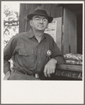 Oregon. Josephine County, near Grants Pass. Deputy sheriff, stationed at paymaster's window on large Williamette hop ranch. Owner employs between 500 and 600 hop pickers for three weeks each year