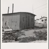 Washington, near Yakima. Close-up of present dwelling from which family will move into basement house