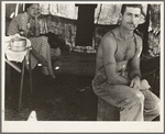 Unemployed lumber worker goes with his wife to the bean harvest. Note social security number tattooed on his arm. Oregon. See general caption number 46