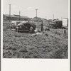 Living conditions for migrant potato pickers. Note potato sheds across the road. Siskiyou County, California. General caption number 63-1