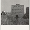 Sign on camp site opposite potato packing sheds. Tulelake, Siskiyou County, California. General caption number 63-1
