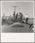 Town pump of Tulelake at railroad yard. Tulelake, Siskiyou County, California. Over 1500 people depend on hauled water for drinking the year round. During potato harvest, this pump also serves the migratory pickers. General caption number 44