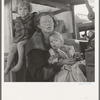 Mother and two children on the road. Tulelake, Siskiyou County, California. General caption number 65