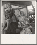 Mother and two children on the road. Tulelake, Siskiyou County, California. General caption number 65