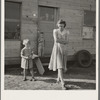 Young mother, twenty five, says "Next year we'll be painted and have a lawn and flowers." Rural shacktown, near Klamath Falls, Oregon. General caption number 47