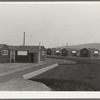 Another view of the newly constructed camp, showing type of shelter units (FSA - Farm Security Administration). Near McMinnville, Yamhill County, Oregon.