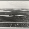 Looking down the newly plowed wheat fields of the Umatilla Valley, Oregon. Thirteen miles south of Pendleton, Umatilla County, Oregon