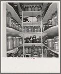 Mrs. Granger's storeroom. She has 500-600 quarts of canned food. "You never know what may happen." Yamhill farms. (FSA - Farm Security Administration). Yamhill County, Williamette Valley, Oregon