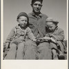 Franklin Schroeder, from South Dakota, and his two older boys. Dead Ox Flat, Malheur County, Oregon. General caption number 67-111