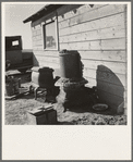 Stoves outside the Browning house being repaired for winter use. Dead Ox Flat, Malheur County, Oregon. General caption 67-111