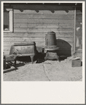 Stoves outside the Browning house being repaired for winter use. Dead Ox Flat, Malheur County, Oregon. General caption 67-111