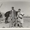 The Schroeder family on their new eighty-acre farm. Dead Ox Flat, Malheur County, Oregon. General caption number 67-111