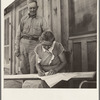 Cow Hollow farmer, came from Oklahoma, has received FSA (Farm Security Administration) loan to help them establish their new place. Wife is co-signer with her husband on chattel mortgage. She signs with an "X." Malheur County, Oregon