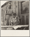 Cow Hollow farmer, came from Oklahoma, has received FSA (Farm Security Administration) loan to help them establish their new place. Wife is co-signer with her husband on chattel mortgage. She signs with an "X." Malheur County, Oregon