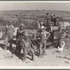 Stephen brothers. Joe, Jim, Eugene, Fred. All from Nebraska. All good farmers. Their combine purchased by FSA (Farm Security Administration) cooperators loan. Nyssa Heights district, Malheur County, Oregon