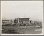 The home of a new farmer who has successfully established himself on the raw land. He has repaid his FSA (Farm Security Administration) loan of twelve hundred and forty-eight dollars in full. Family arrived on the project in August 1937